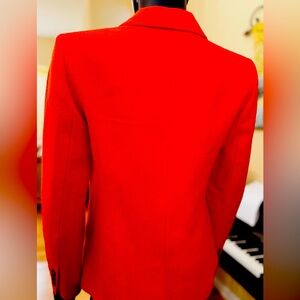 Brand new Ann Taylor, orange blazer. Size 2P.